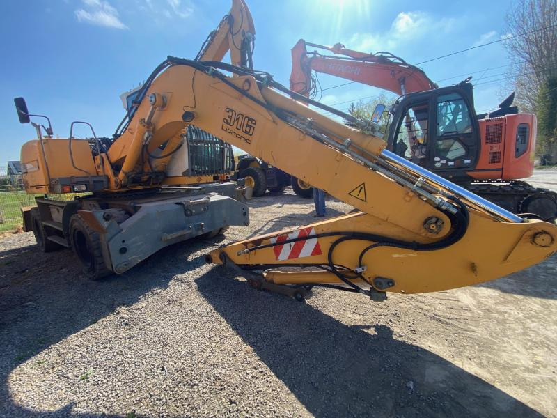 Liebherr A316Litronic - Riteņu ekskavators: foto 3 Liebherr A316Litronic - Riteņu ekskavators: foto 3