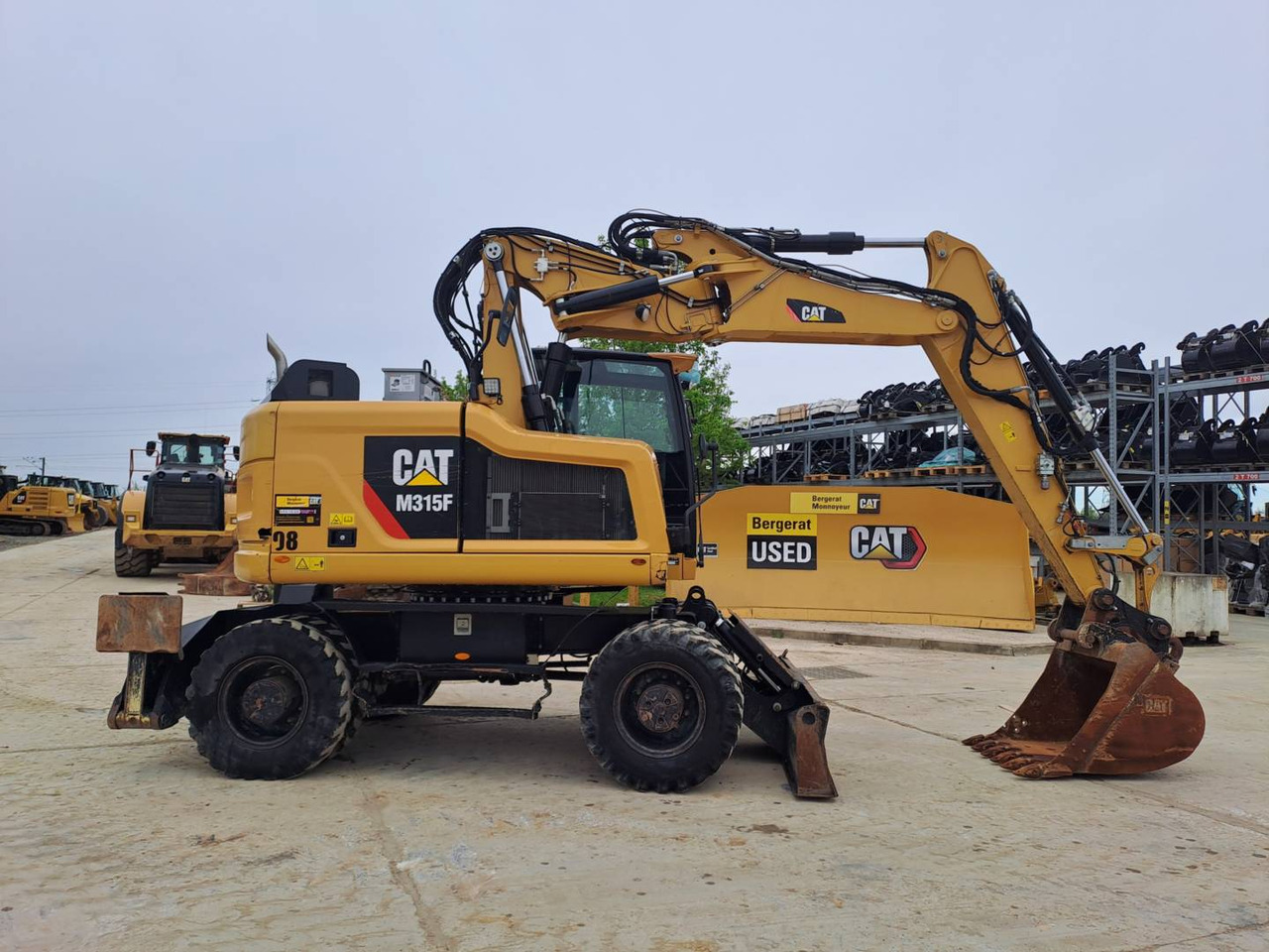 CAT M315F IVC - Riteņu ekskavators: foto 1 CAT M315F IVC - Riteņu ekskavators: foto 1