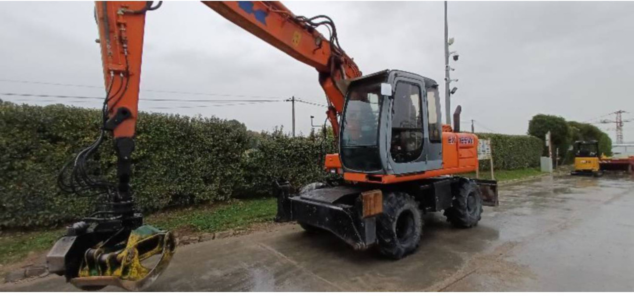 FIAT ALLIS / NEW HOLLAND EX165W - Riteņu ekskavators: foto 2 FIAT ALLIS / NEW HOLLAND EX165W - Riteņu ekskavators: foto 2