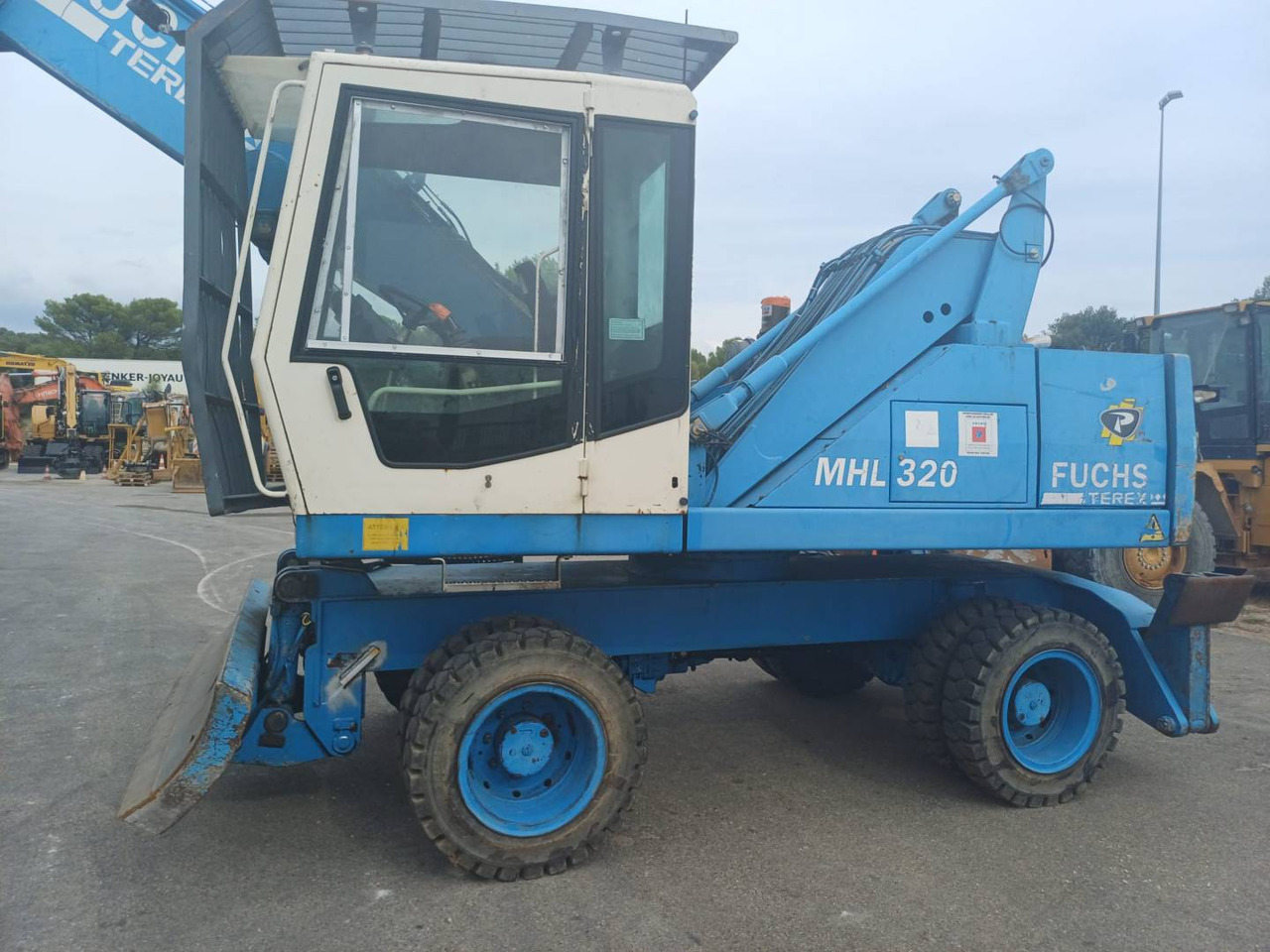 FUCHS MHL320 - Riteņu ekskavators: foto 1 FUCHS MHL320 - Riteņu ekskavators: foto 1