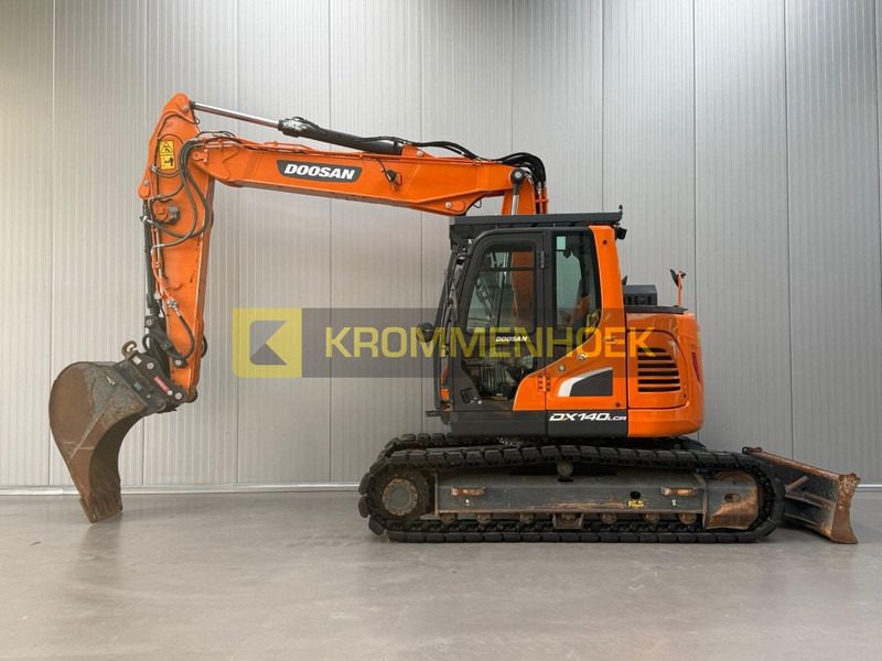 Doosan DX 140 LCR-5 Oilquick - Kāpurķēžu ekskavators: foto 1 Doosan DX 140 LCR-5 Oilquick - Kāpurķēžu ekskavators: foto 1