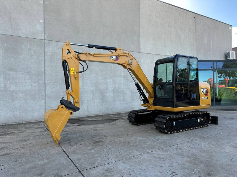 Caterpillar 305.5E2 - Kāpurķēžu ekskavators: foto 1 Caterpillar 305.5E2 - Kāpurķēžu ekskavators: foto 1