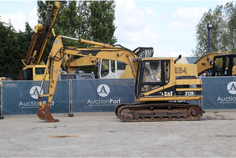 Caterpillar 312BL - Kāpurķēžu ekskavators: foto 1 Caterpillar 312BL - Kāpurķēžu ekskavators: foto 1