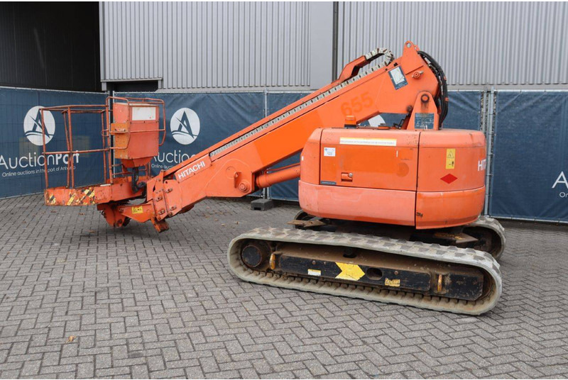 Hitachi HX99B-2 - Teleskopiskais pacēlājs: foto 3 Hitachi HX99B-2 - Teleskopiskais pacēlājs: foto 3