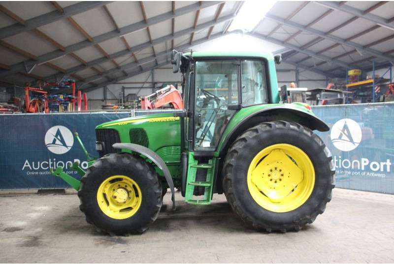John Deere 6320 Premium - Traktors: foto 2 John Deere 6320 Premium - Traktors: foto 2