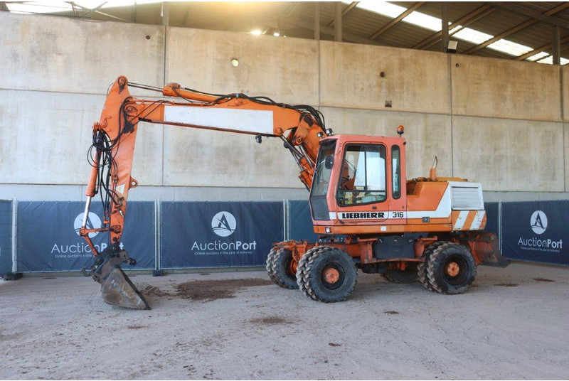 Liebherr A316 - Riteņu ekskavators: foto 1 Liebherr A316 - Riteņu ekskavators: foto 1