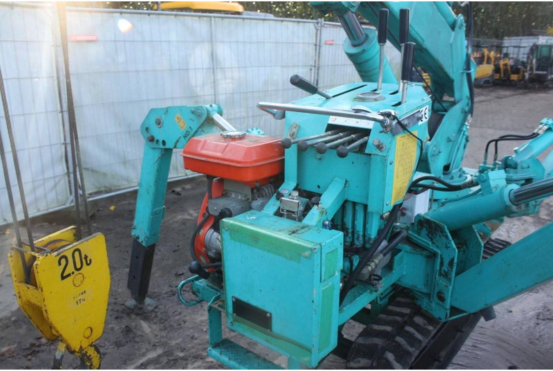 Kāpurķēžu celtnis Maeda 205: foto 15