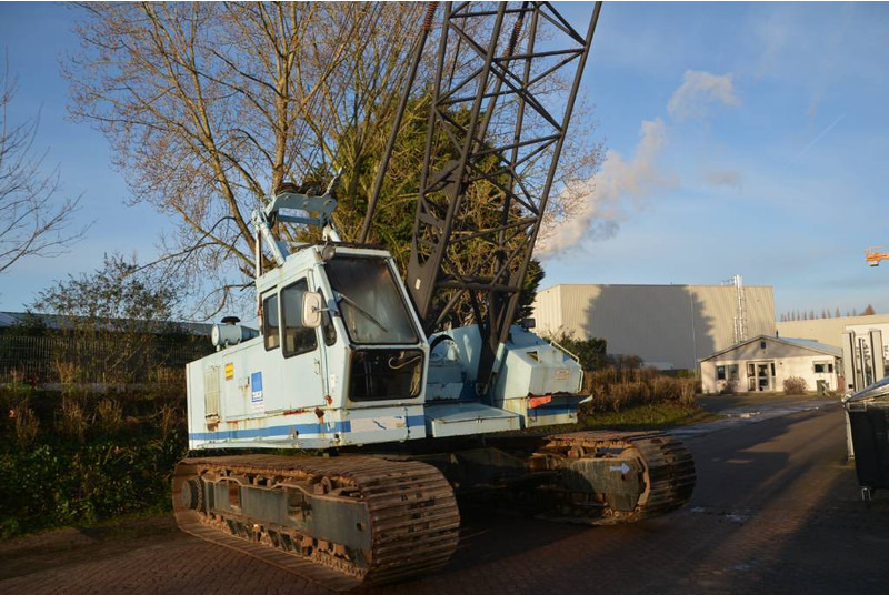 Hitachi KH 125-3 - Kāpurķēžu celtnis: foto 1 Hitachi KH 125-3 - Kāpurķēžu celtnis: foto 1