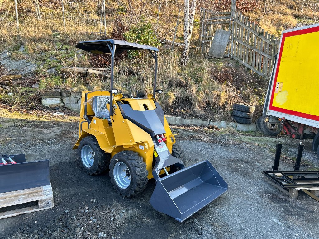 Skid steer loader YC390 - Kompaktiekrāvējs: foto 2 Skid steer loader YC390 - Kompaktiekrāvējs: foto 2