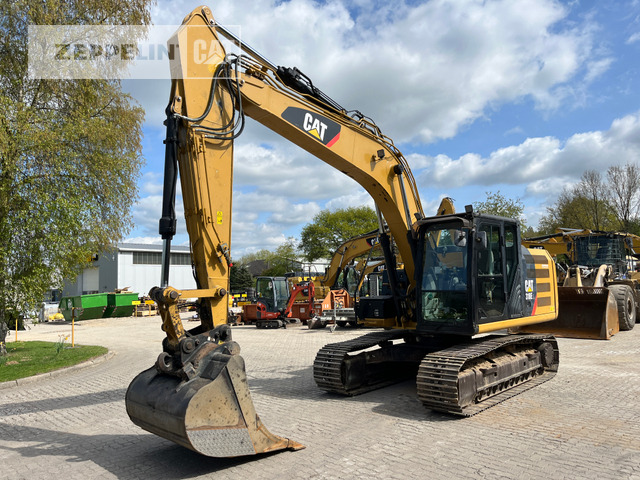 Cat 318EL - Kāpurķēžu ekskavators: foto 1 Cat 318EL - Kāpurķēžu ekskavators: foto 1