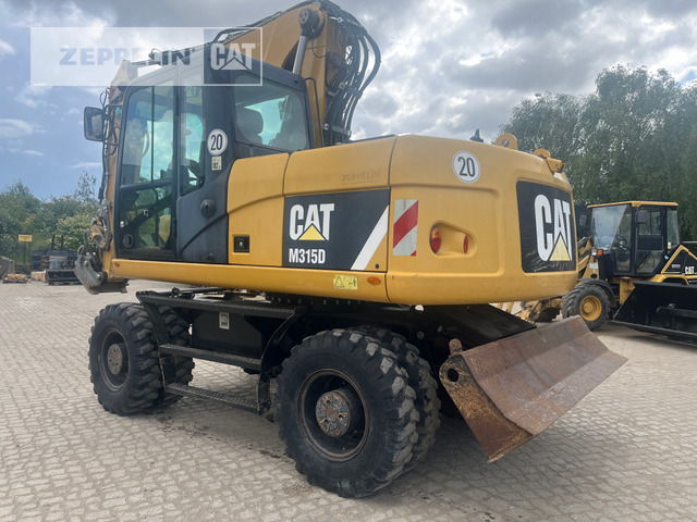 Cat M315D - Riteņu ekskavators: foto 1 Cat M315D - Riteņu ekskavators: foto 1