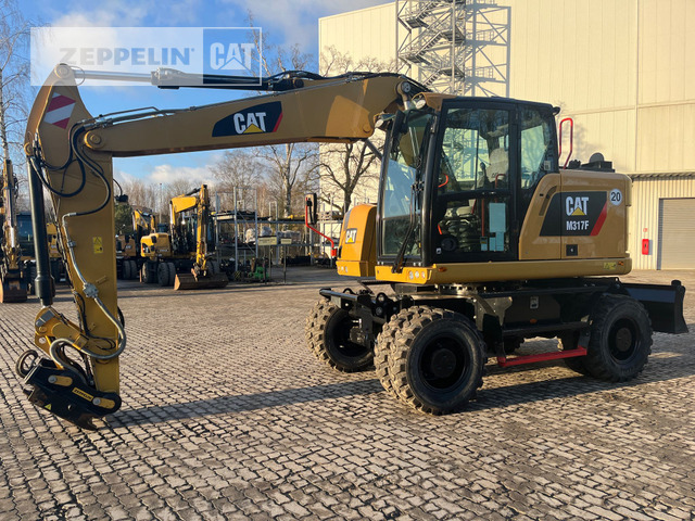 Cat M317F - Riteņu ekskavators: foto 1 Cat M317F - Riteņu ekskavators: foto 1