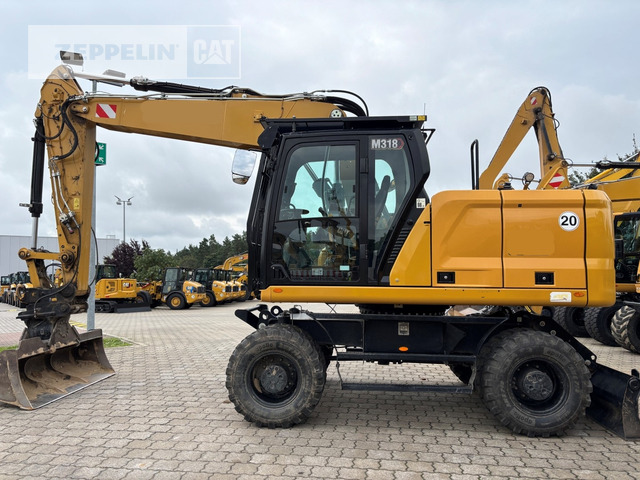 Cat M318-07A - Riteņu ekskavators: foto 1 Cat M318-07A - Riteņu ekskavators: foto 1