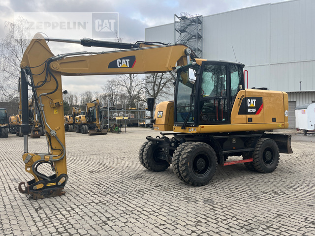 Cat M320F - Riteņu ekskavators: foto 1 Cat M320F - Riteņu ekskavators: foto 1