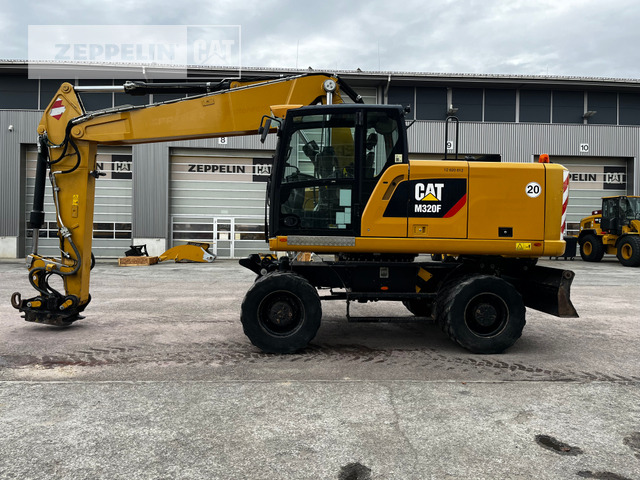 Cat M320F - Riteņu ekskavators: foto 1 Cat M320F - Riteņu ekskavators: foto 1
