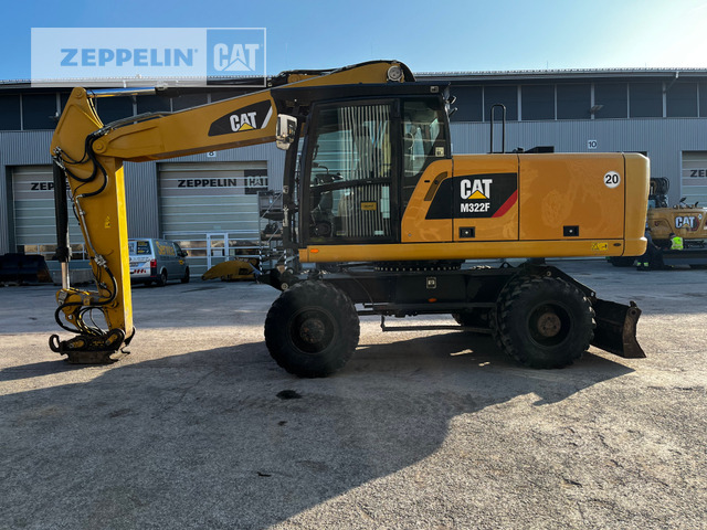 Cat M322F - Riteņu ekskavators: foto 1 Cat M322F - Riteņu ekskavators: foto 1