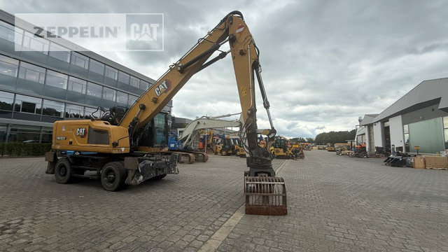 Cat MH3022-06C - Atkritumu iekrāvējs: foto 1 Cat MH3022-06C - Atkritumu iekrāvējs: foto 1