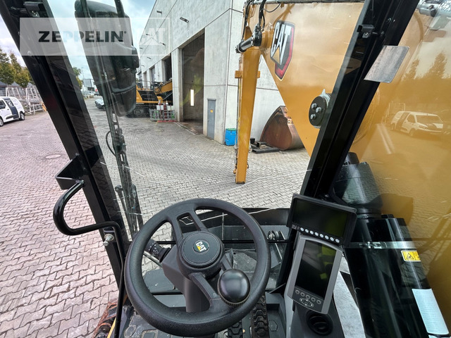 Atkritumu iekrāvējs Cat MH3024-06C: foto 35