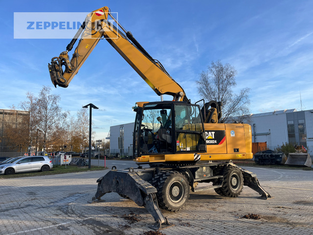 Cat MH3024-06C - Atkritumu iekrāvējs: foto 3 Cat MH3024-06C - Atkritumu iekrāvējs: foto 3