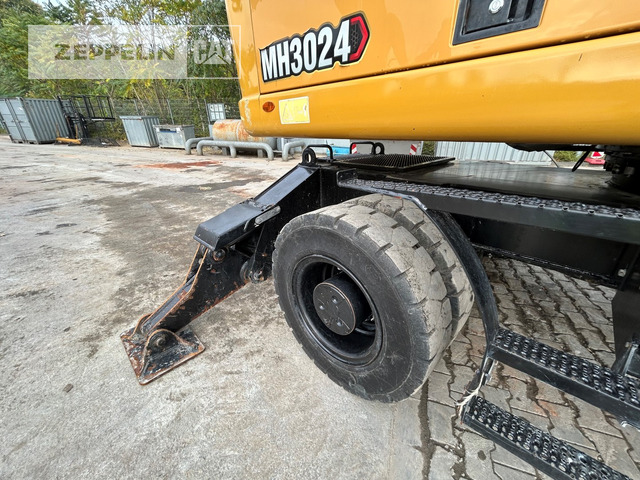 Atkritumu iekrāvējs Cat MH3024-06C: foto 25