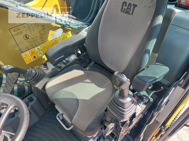 Atkritumu iekrāvējs Cat MH3024-06C: foto 34