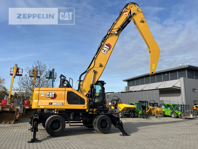 Cat MH3024-07A - Atkritumu iekrāvējs: foto 3 Cat MH3024-07A - Atkritumu iekrāvējs: foto 3