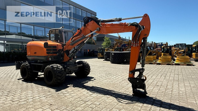 Wacker EW100 - Riteņu ekskavators: foto 1 Wacker EW100 - Riteņu ekskavators: foto 1