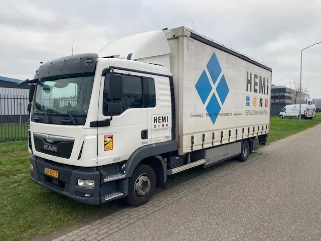 MAN TGL 12,250 met schuifzeilopbouw en laadklep , euro 6. - Kravas automašīna ar tentu: foto 1 MAN TGL 12,250 met schuifzeilopbouw en laadklep , euro 6. - Kravas automašīna ar tentu: foto 1