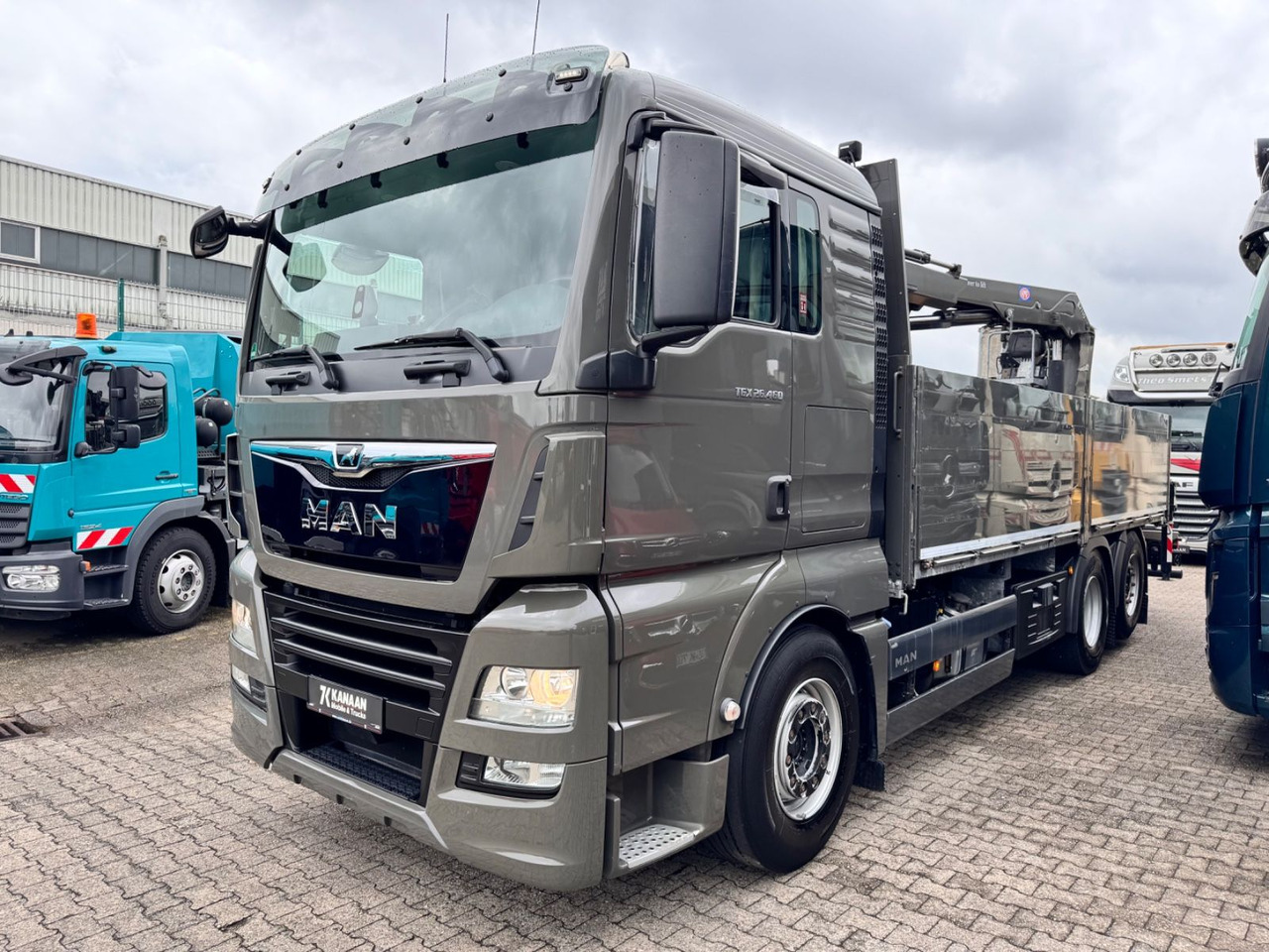 MAN 26.460 TGX Baustoffkran HMF 2110-L3 - Kravas auto ar manipulatoru: foto 2 MAN 26.460 TGX Baustoffkran HMF 2110-L3 - Kravas auto ar manipulatoru: foto 2